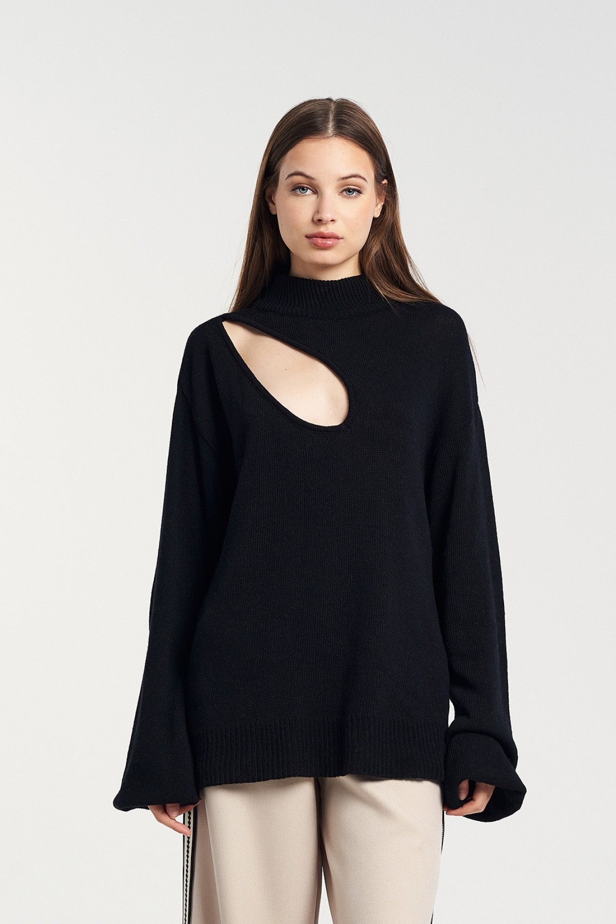 CHRISTELLE NIMA CASHMERE BLEND CUT OUT SWEATER IN BLACK