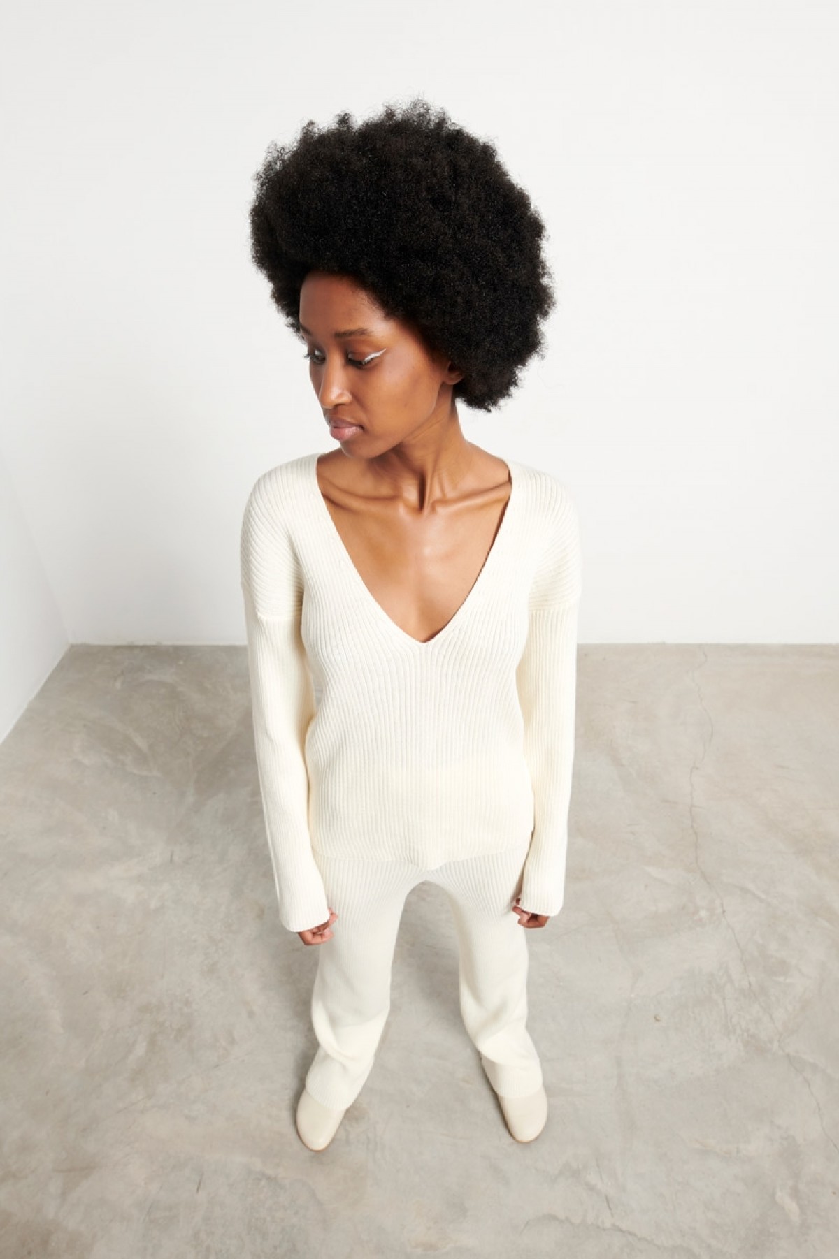 CHRISTELLE NIMA WOOL KNITTED OFF WHITE PANTS 